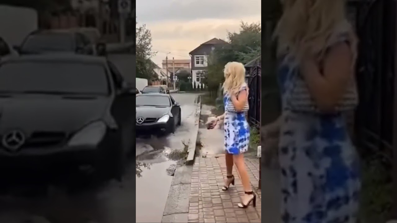 Effective way to avoid being splashed on as a car drove by a puddle?. #shorts #viralvideo #memes